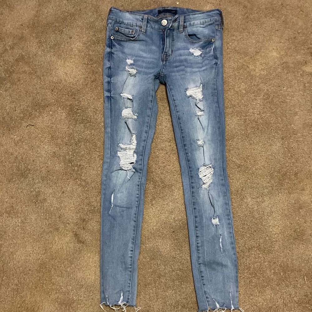 Blue ripped skinny jeans